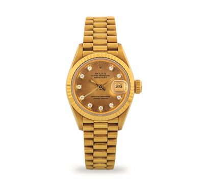 Lady-Datejust ref 69178 in oro giallo 18k, quadrante champagne con indici in brillanti, circa 199...