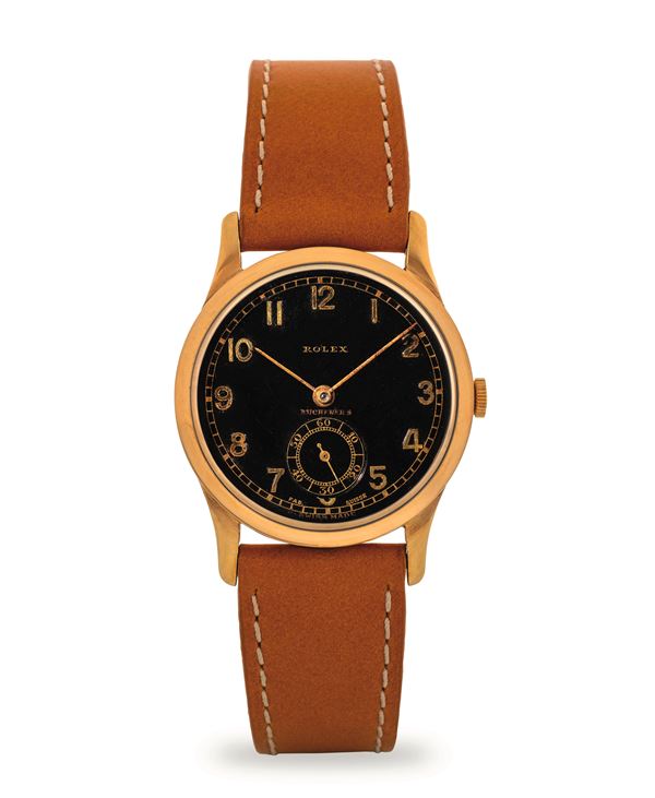 Rolex - Chronometre coin case ref 2582 in 18k yellow gold, black dial with Arabic numerals personalised for Bucherer's, circa 1930
