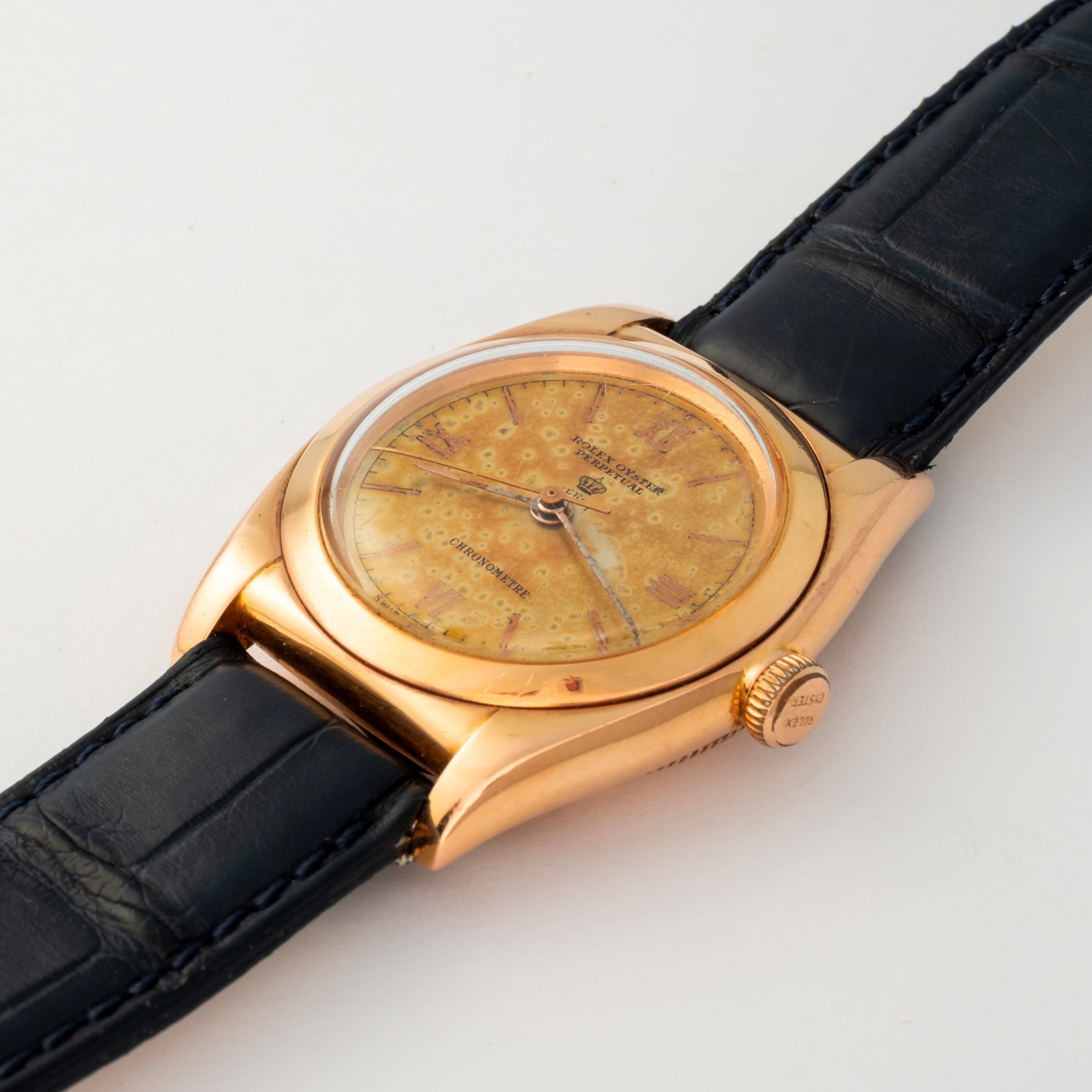 Rolex - Ovetto Oyster Perpetual ref. 3131 in oro rosa 18k con quadrante champagne, circa 1940