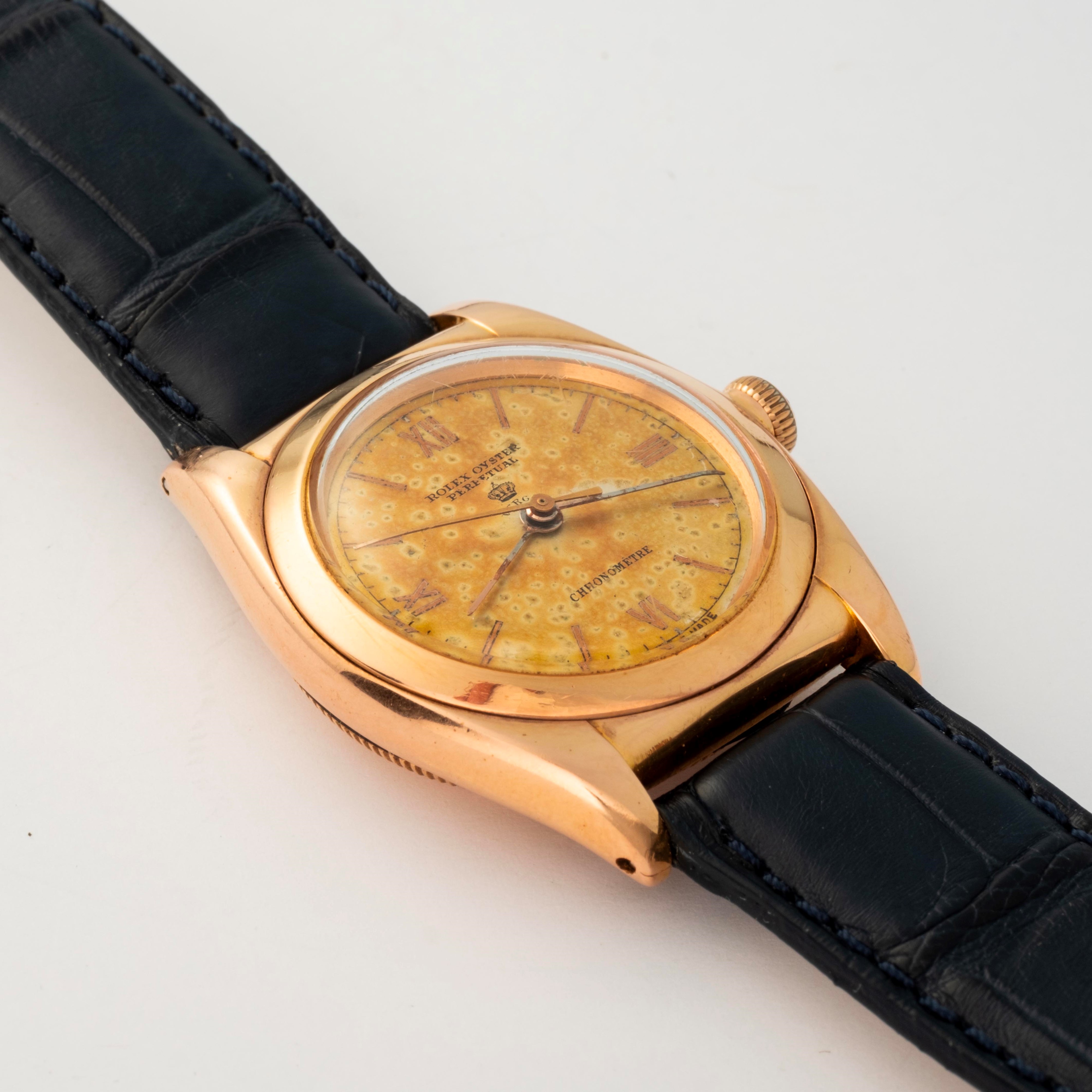 Rolex - Ovetto Oyster Perpetual ref. 3131 in oro rosa 18k con quadrante champagne, circa 1940