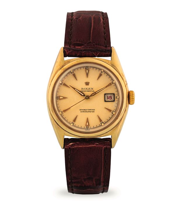 Rolex - Oyster Perpetual Ovettone ref 6075 in 10k yellow gold, champagne dial with Roulette date display, circa 1940