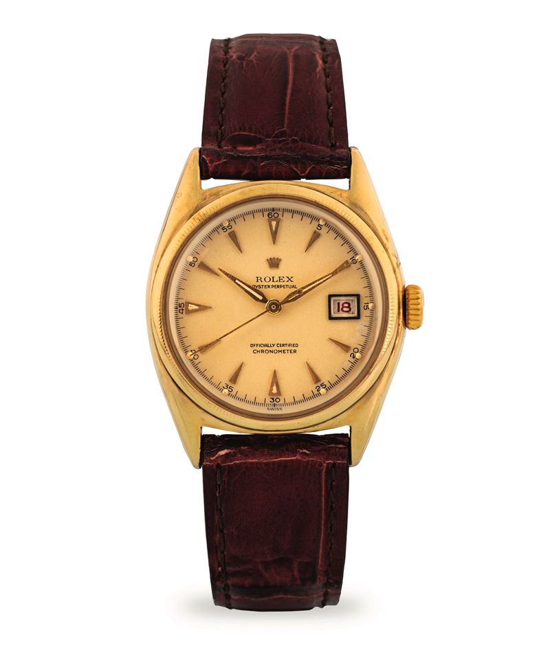 Rolex : Oyster Perpetual Ovettone ref 6075 in 10k yellow gold, champagne dial with Roulette date display, circa 1940  - Auction Wristwatches - Cambi Casa d'Aste