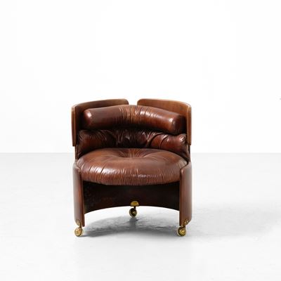Poltrona in cuoio e ottone