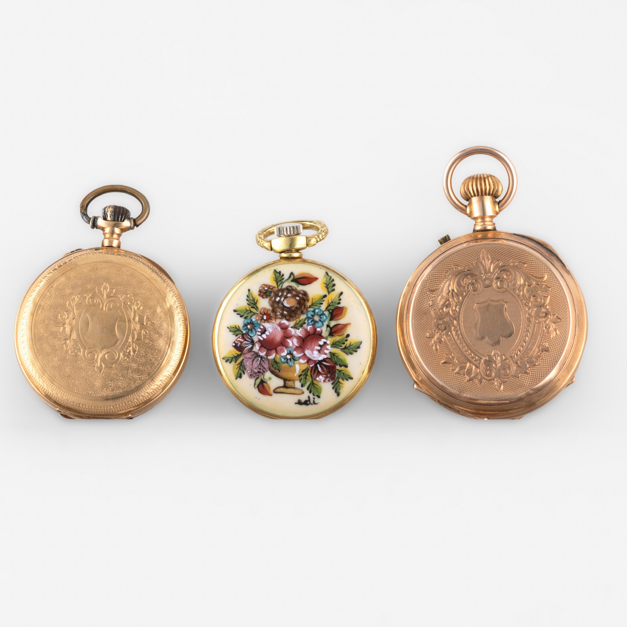 Lotto di tre orologi da tasca in oro (due 18k, uno 14k)