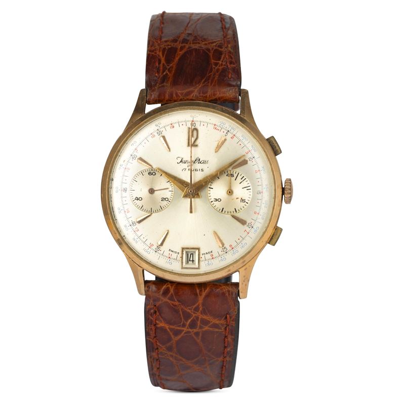 Jungfrau : Cronografo in oro giallo 18k con tasti rettangolari, quadrante argentè con indici applicati e datario al sei, carica manuale, 36 mm   - Asta Orologi da Polso - Cambi Casa d'Aste