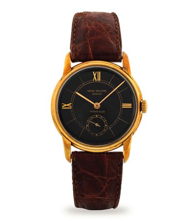 Calatrava in oro giallo 18k con quadrante nero e numeri romani, circa 1950