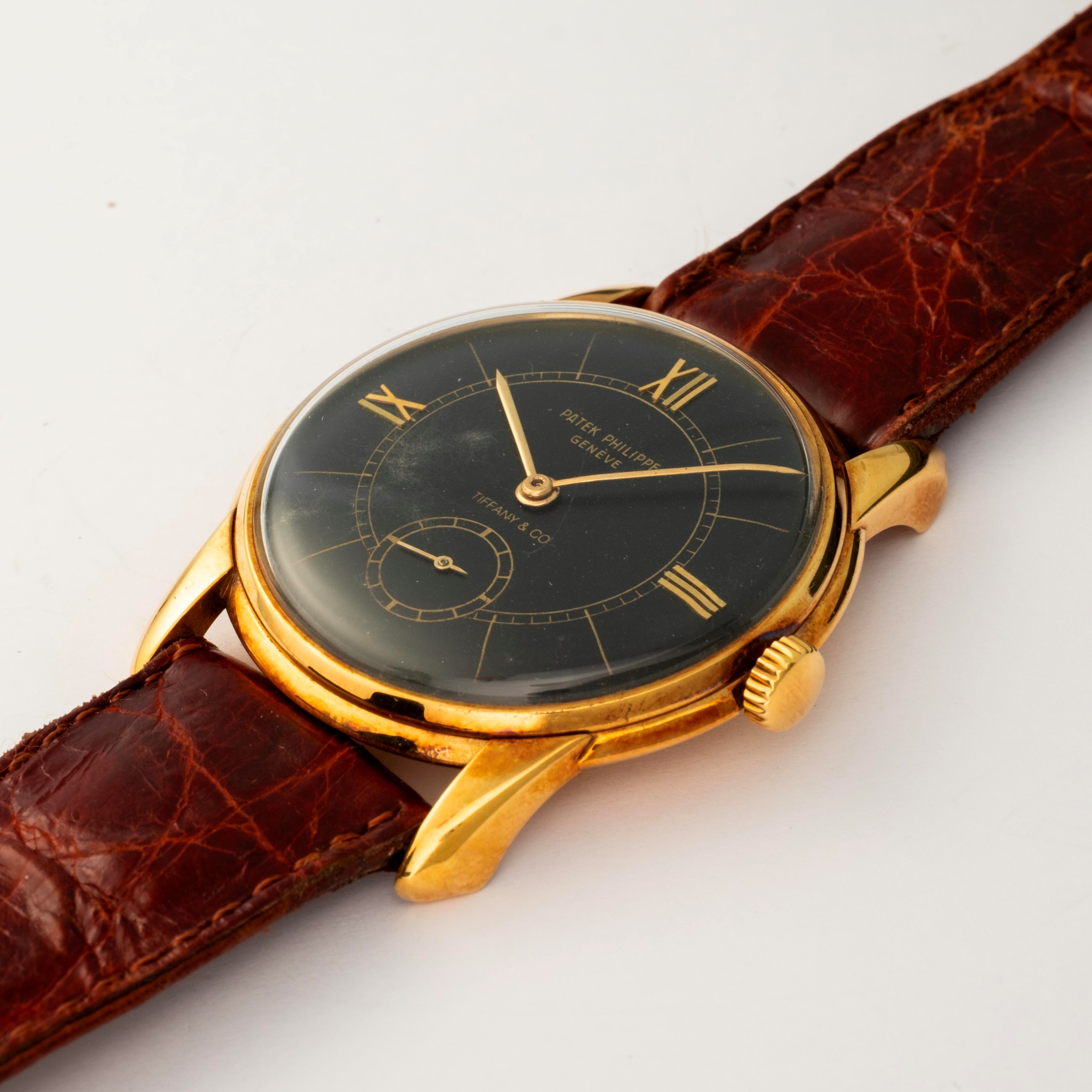 Patek Philippe - Calatrava in oro giallo 18k con quadrante nero e numeri romani, circa 1950