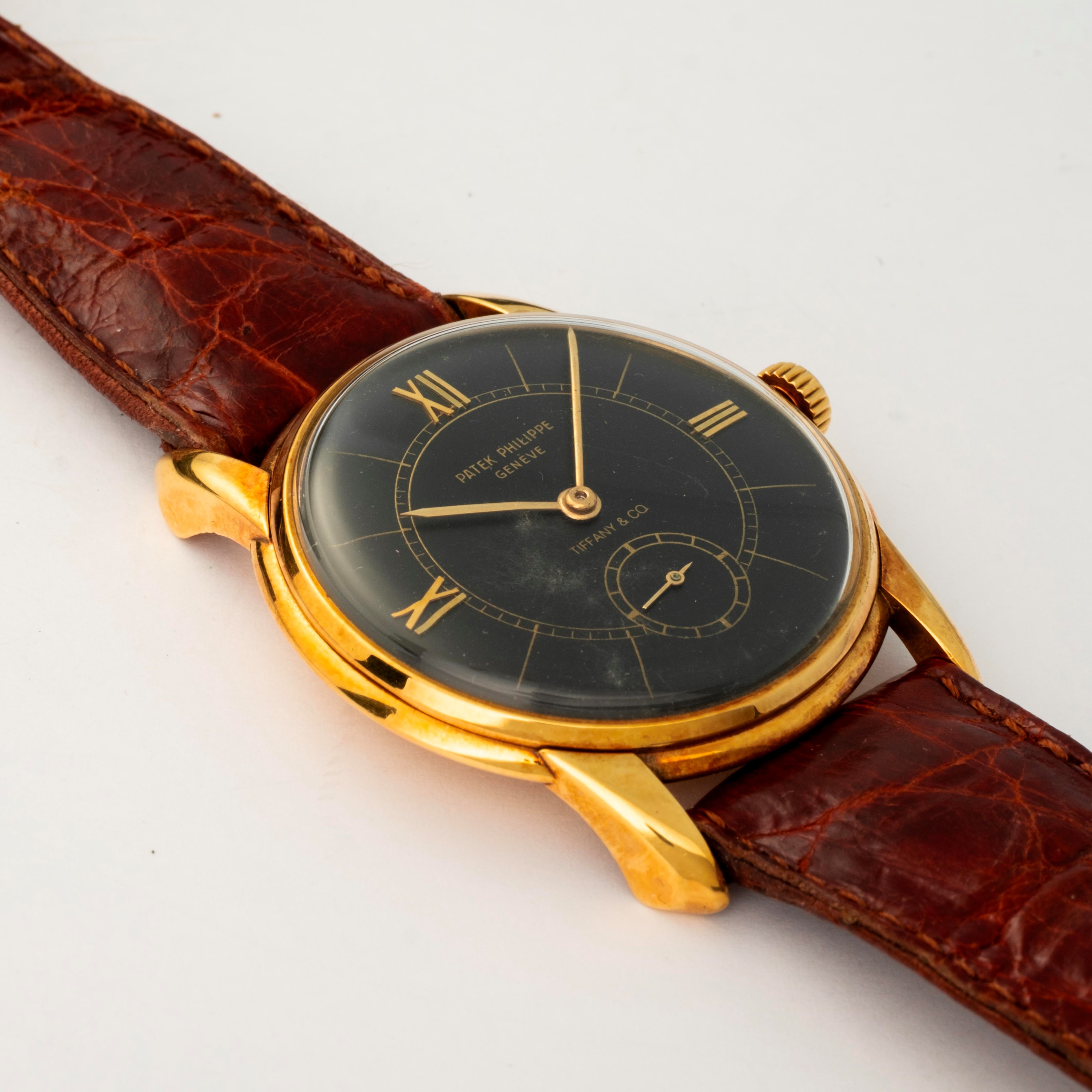 Patek Philippe - Calatrava in oro giallo 18k con quadrante nero e numeri romani, circa 1950