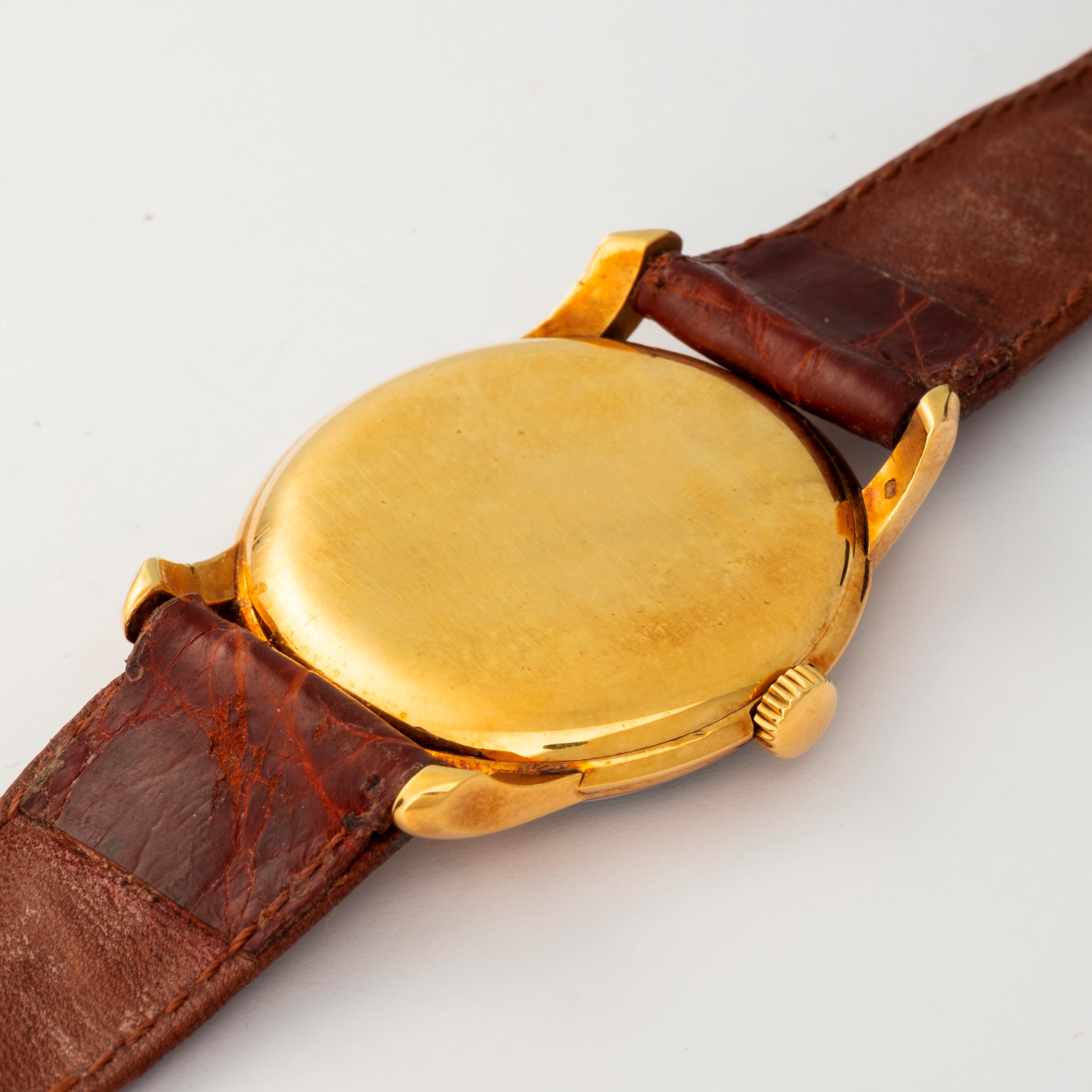 Patek Philippe - Calatrava in oro giallo 18k con quadrante nero e numeri romani, circa 1950