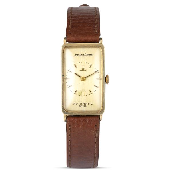 Jaeger-LeCoultre - Orologio di forma ref. 7558 in oro giallo 14k, quadrante champagne con indici applicati, carica automatica, 34x21 mm
