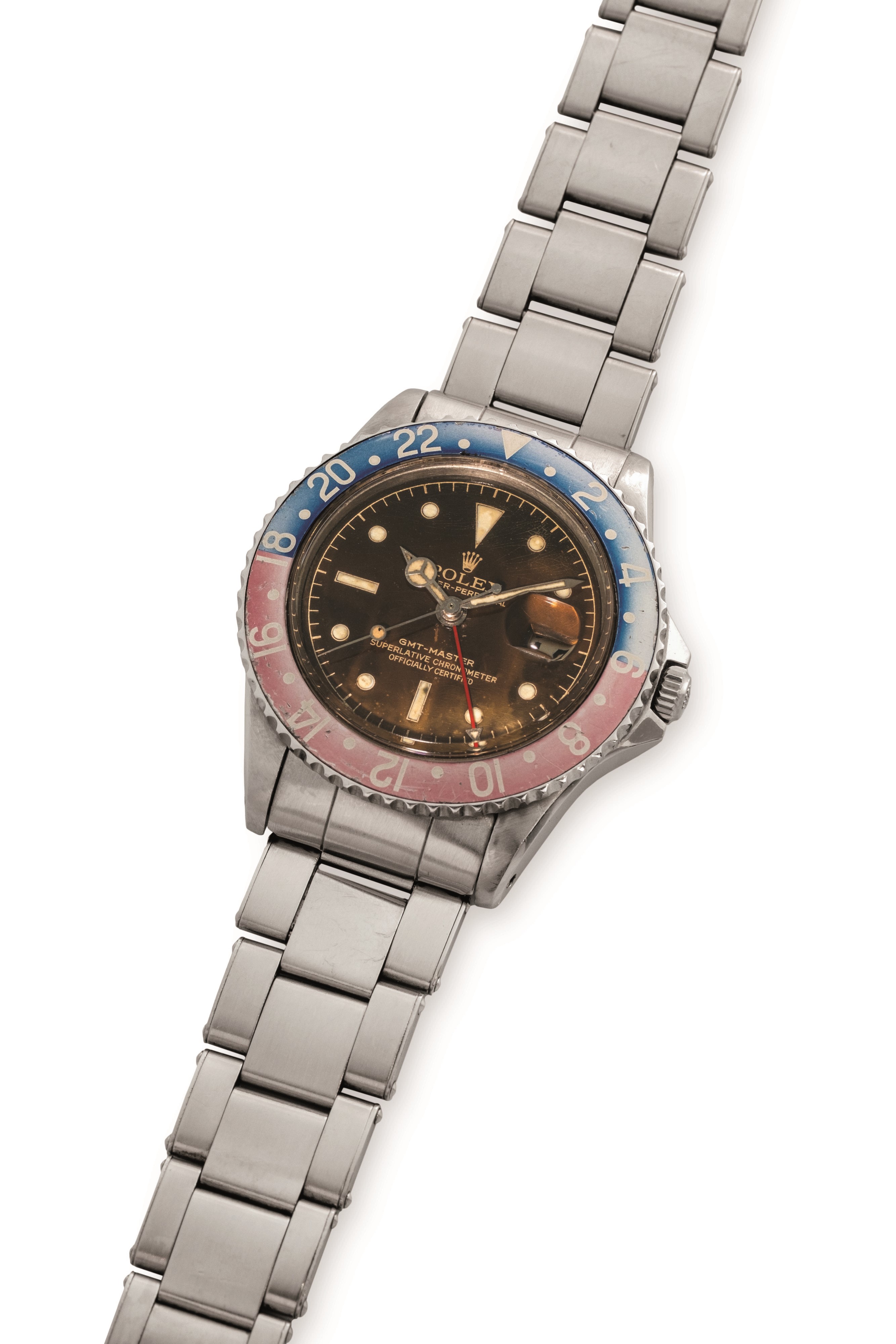 Rolex - GMT Master 'Cornino' ref. 1675, acciaio, quadrante nero virato marrone, circa 1961