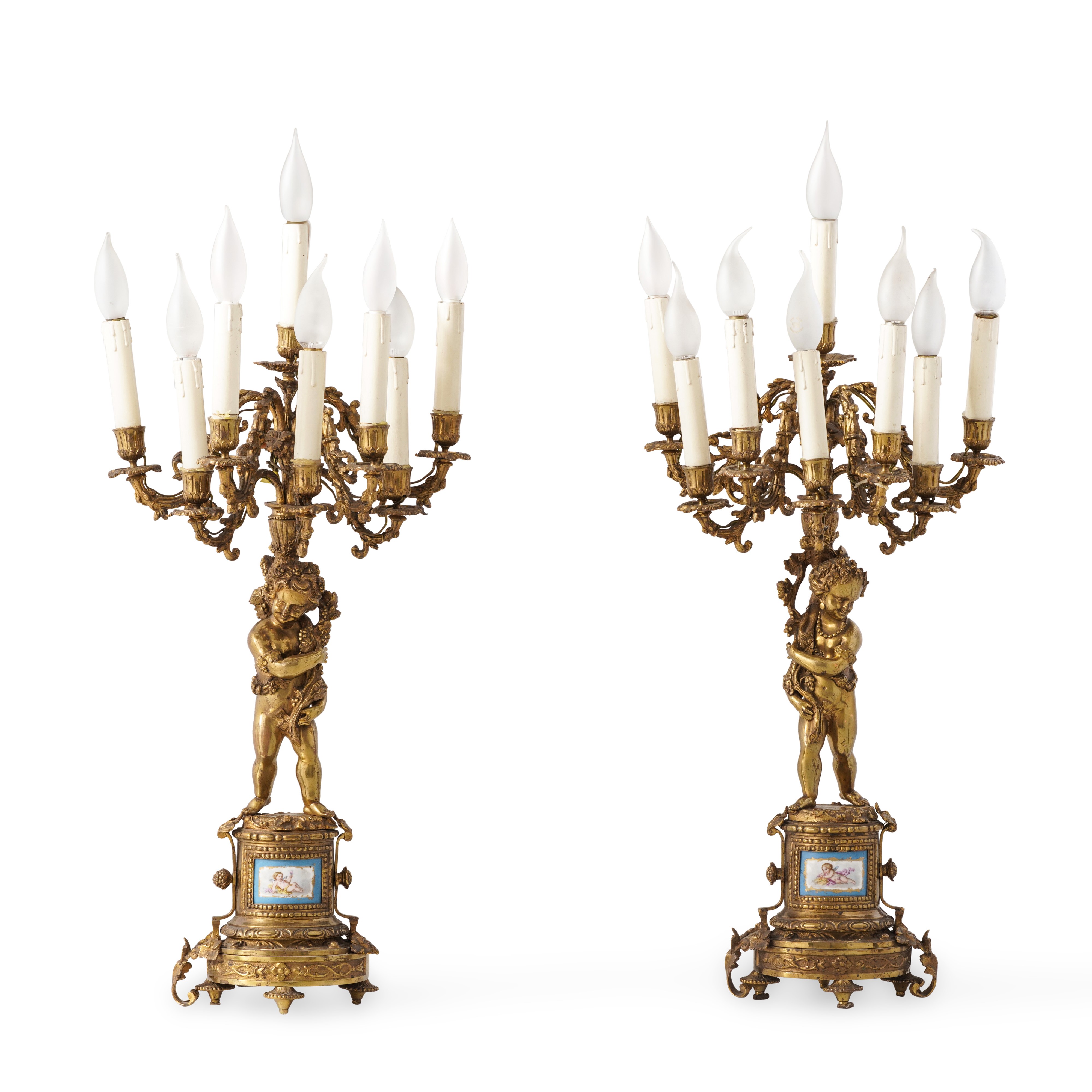 Francia, seconda metà XIX secolo, Trittico da camino Napoleone III: pendola e coppia di candelabr...
