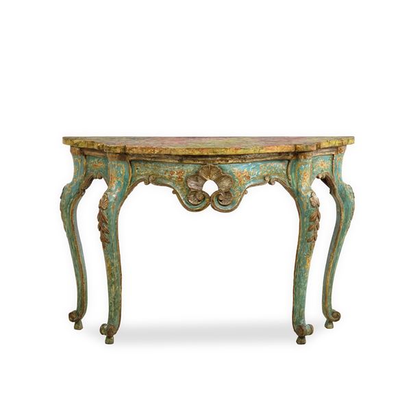 Console in legno intagliato, dipinto e argentato. Elementi antichi