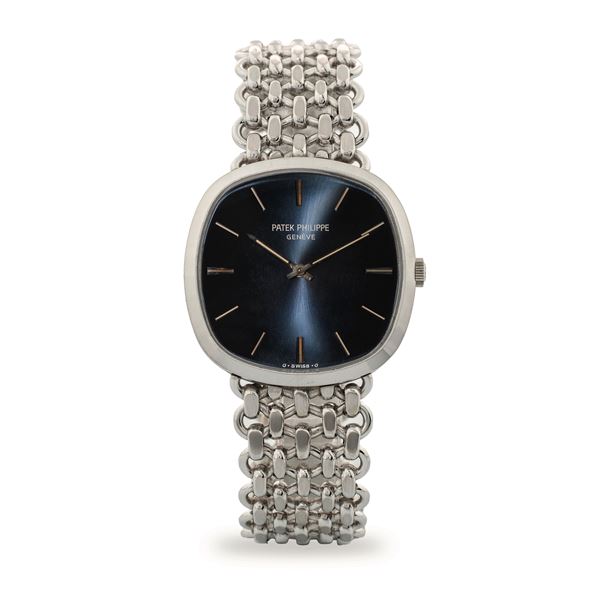 Patek Philippe - Ellipse ref 3544/2 in 18k white gold with integrated chain-link bracelet, blue Soleil dial, with original guarantee, circa 1973