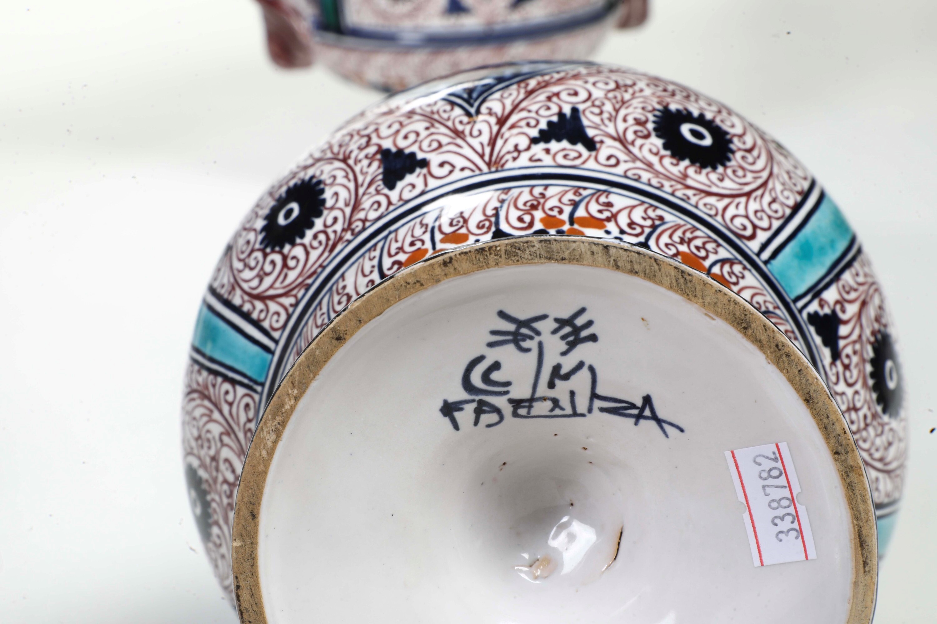 Manifattura C.A.C.F, Faenza, Quattro vasi in maiolica con marca C.A.C.F