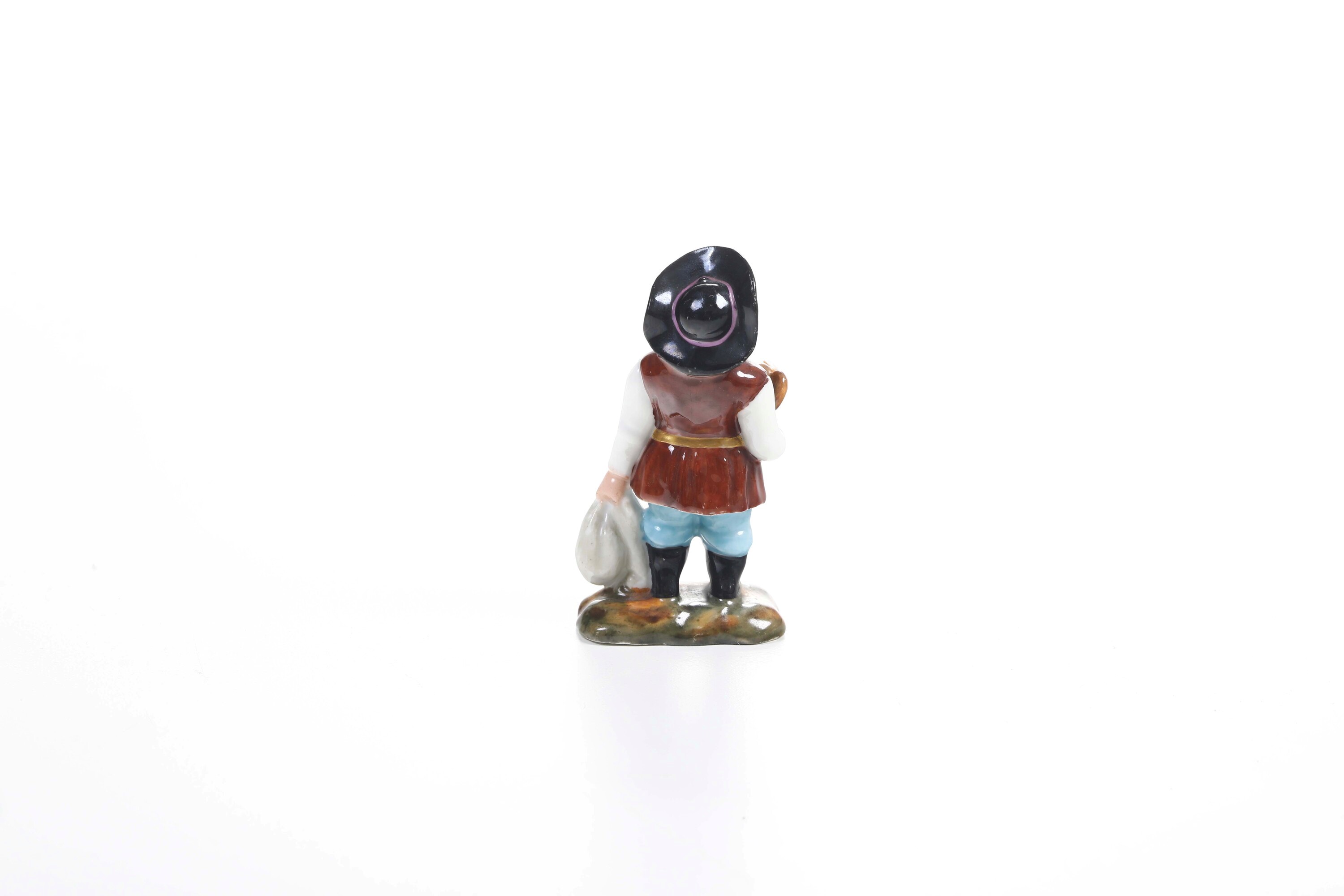 San Pietroburgo, Manifattura dei Fratelli Kornilov, Figurina di Sancho Panza in porcellana, fine ...