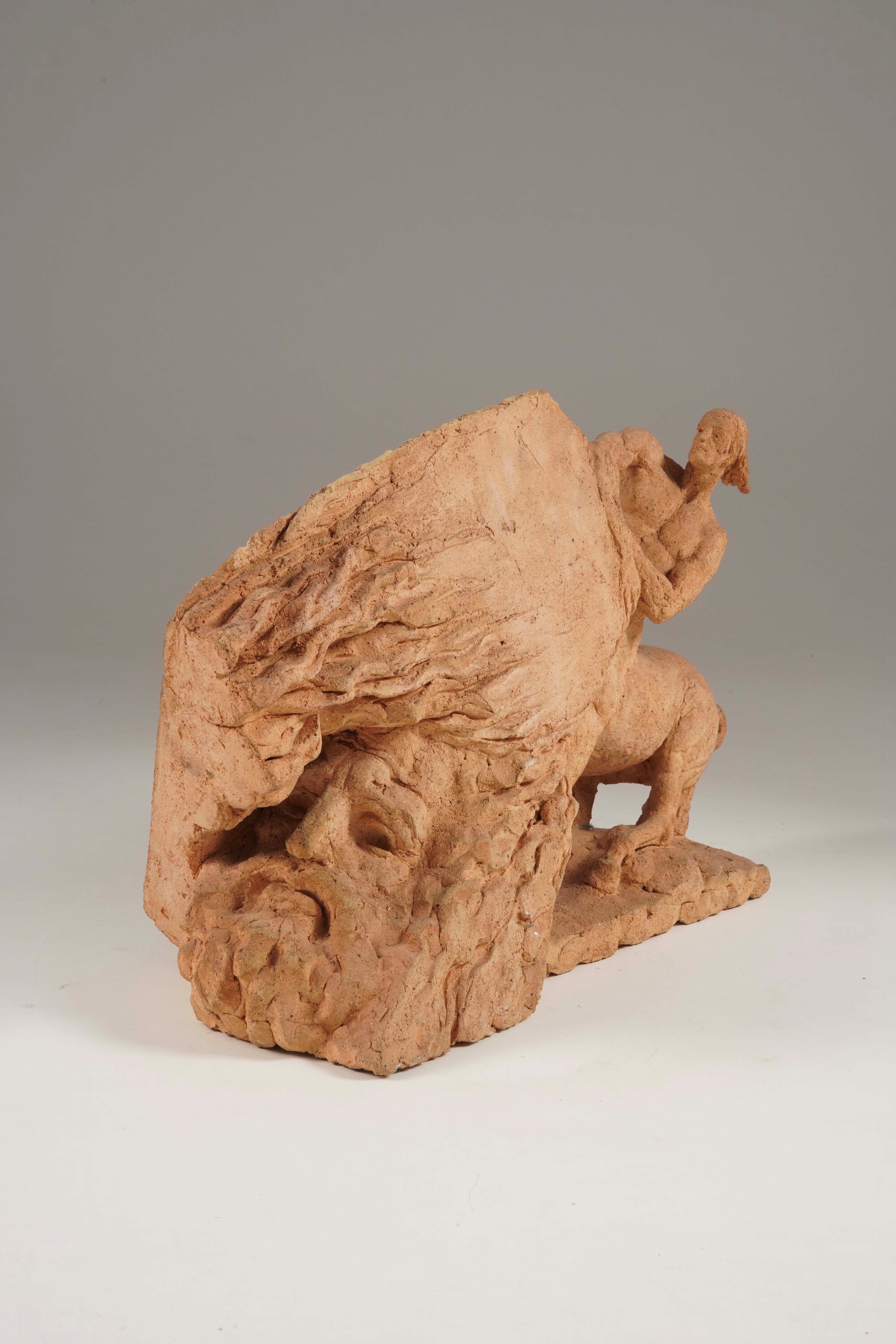 Scultore del XX secolo, Gruppo con centauro e mascherone virile in terracotta