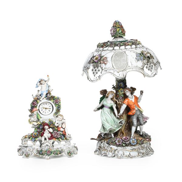 Lampada e orologio da tavolo. Germania, Manifattura della Turingia, XX secolo.