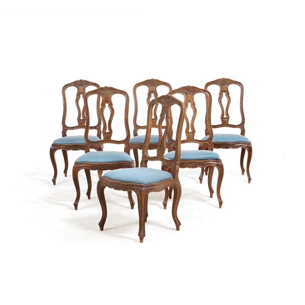 Gruppo di sei sedie in legno intagliato. XIX-XX secolo