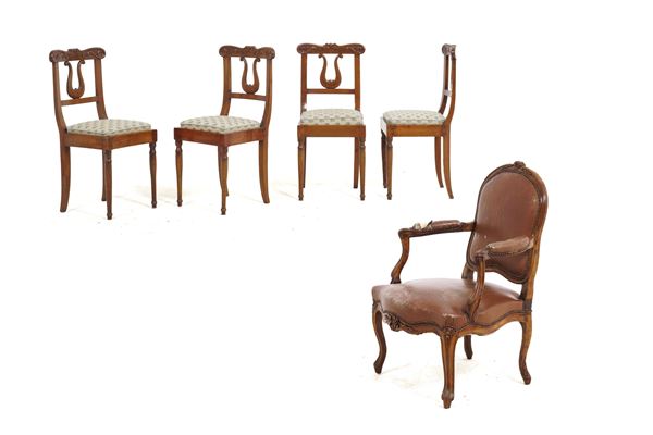 Gruppo di quattro sedie in legno intagliato. XIX secolo