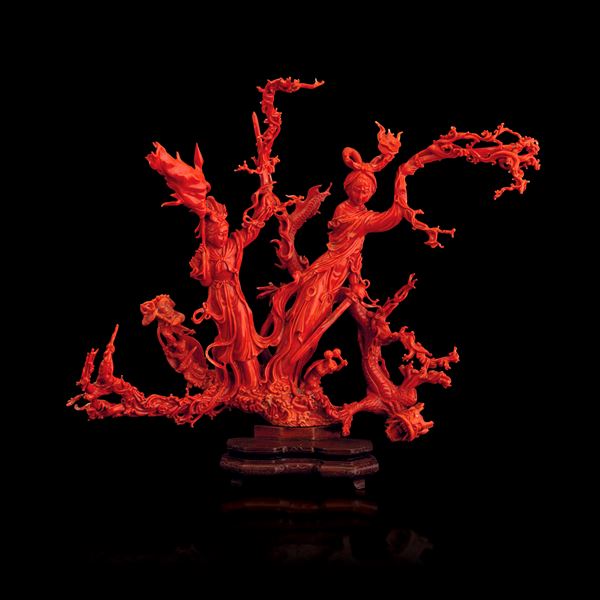 Large group carved in coral depicting a battle scene with Guanyin, a dragon, and other deities, China, Qing Dynasty, 19th century