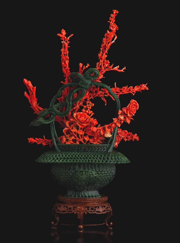 Rare composition consisting of a branch depicting roses carved in red coral set within a pierced spinach jade basket, China, Qing Dynasty, 19th century