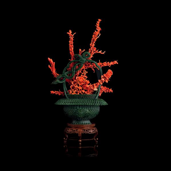 Rare composition consisting of a branch depicting roses carved in red coral set within a pierced spinach jade basket, China, Qing Dynasty, 19th century