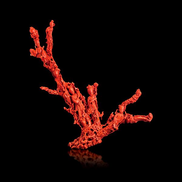 Important group carved in red coral depicting Guanyin with maidens and squirrels, with raised vegetal motifs, China, Qing Dynasty, 19th century