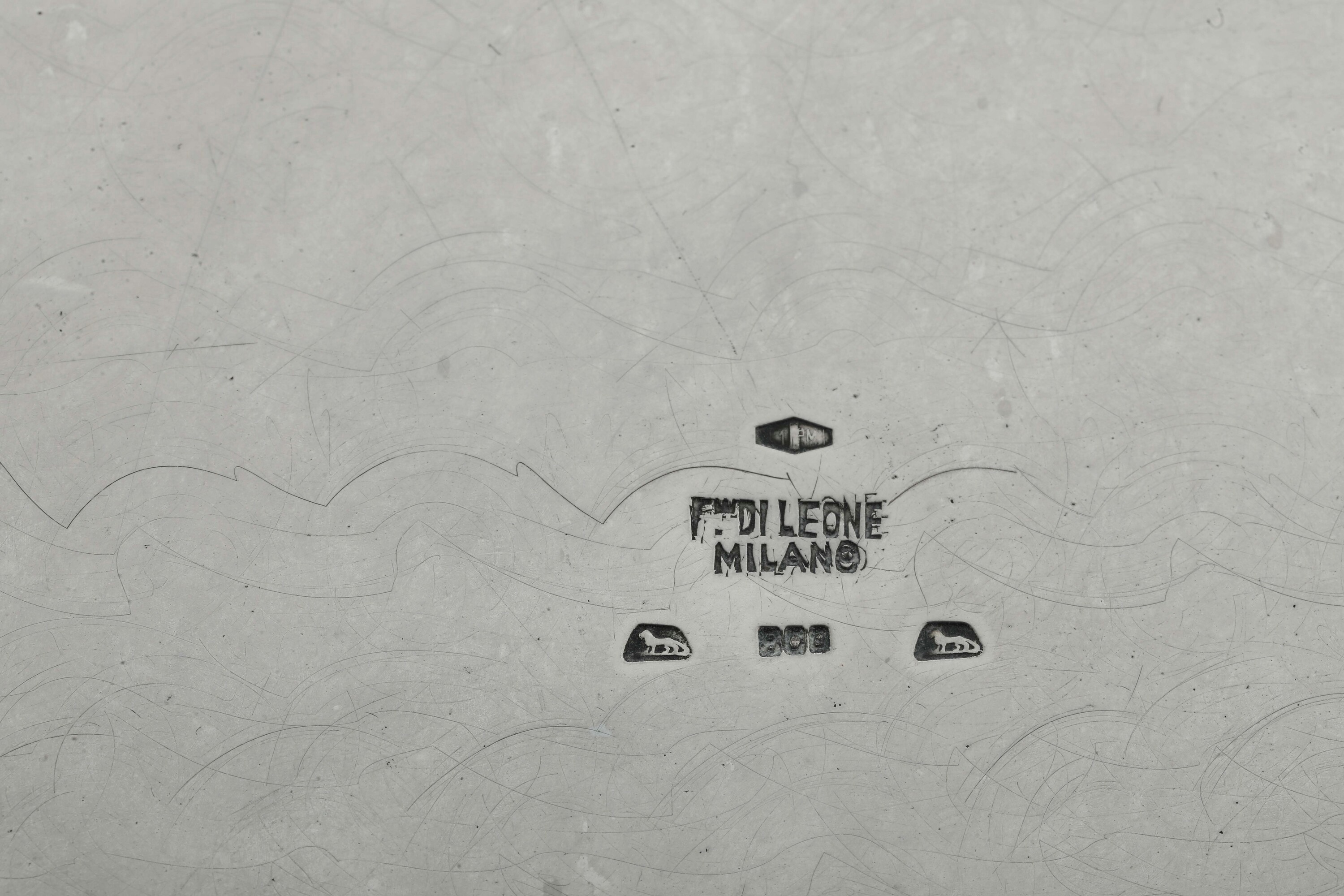 Due Piatti ed un Alzata. un Piatto con Punzone del Fascio,manifattura di Leone, Milano