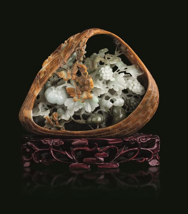 Jadeite carved element depicting a shell with raised vegetal decorations, butterflies, and inscriptions, China, Qing Dynasty, 20th century
