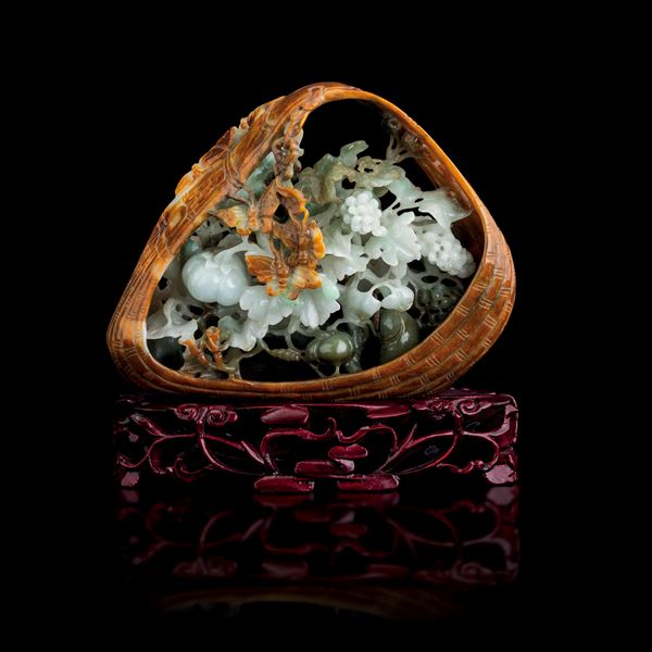 Jadeite carved element depicting a shell with raised vegetal decorations, butterflies, and inscriptions, China, Qing Dynasty, 20th century