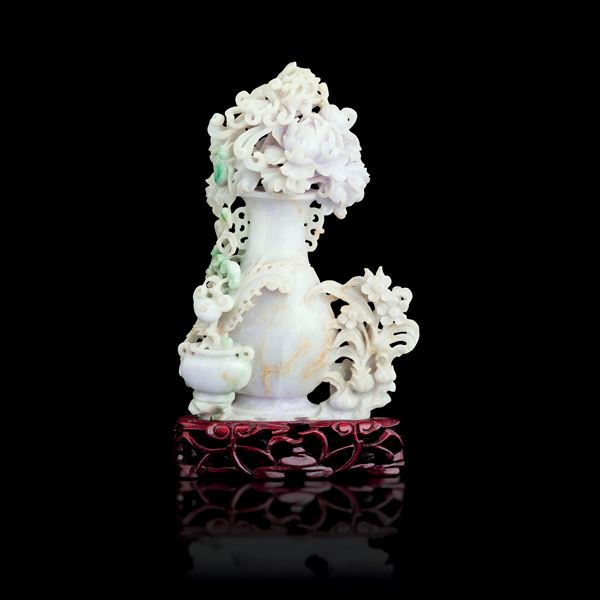 Jadeite vase in lavender tones with apple green hues and raised floral motif decorations, China, Qing Dynasty, 19th century