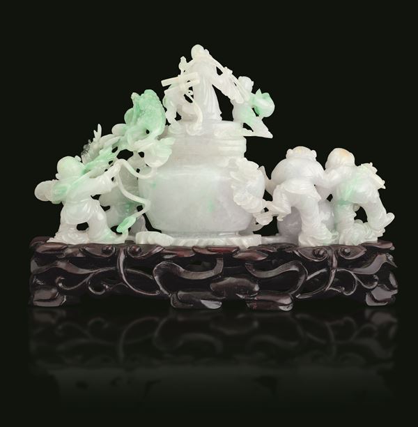 Jadeite vase with apple green hues depicting children playing and raised vegetal decorations, China, Qing Dynasty, early 20th century
