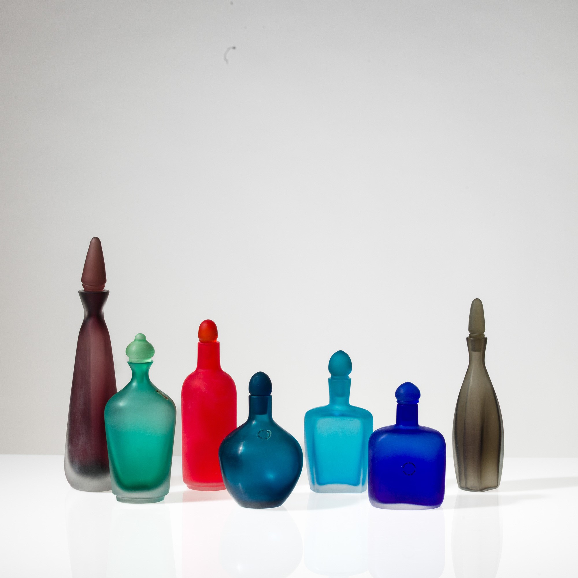 Venini, Serie di sette bottiglie in vetro sommerso (Miniature) Murano, 1994-2009
