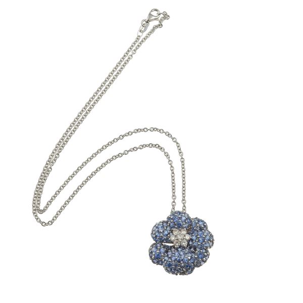 Sabbadini. Pendente "fiore" con pavé di zaffiri e diamanti