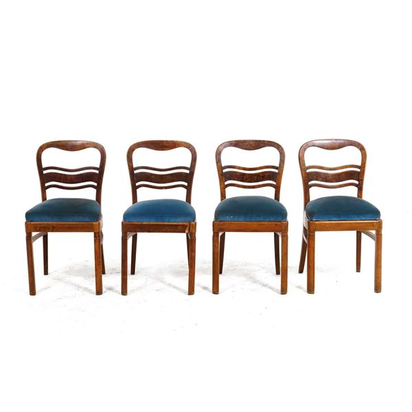 Quattro sedie in legno. XX secolo