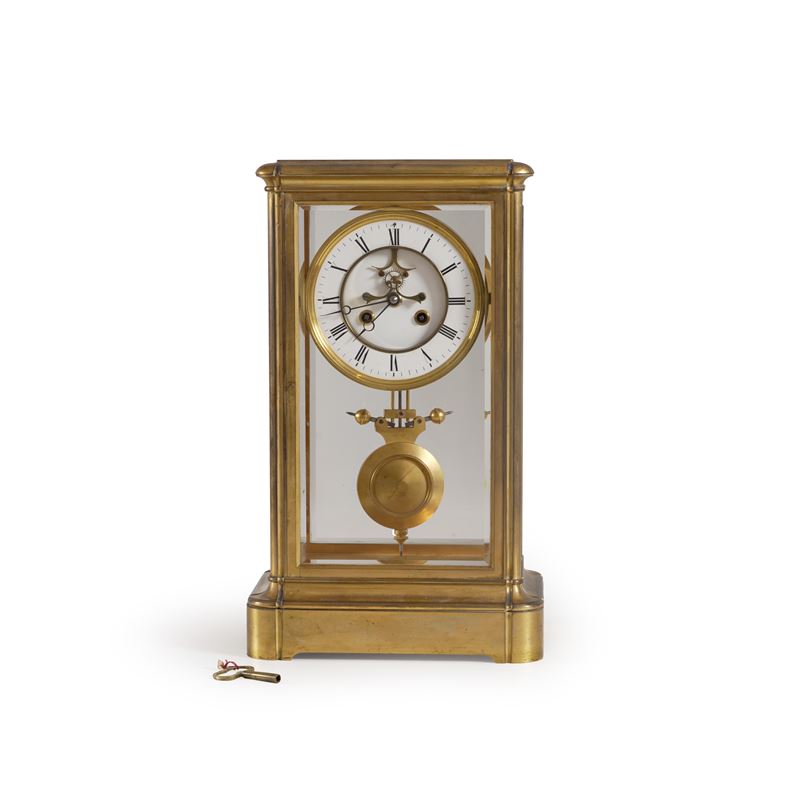 Pendola da tavolo in teca. XX secolo  - Auction Antiques - Cambi Casa d'Aste