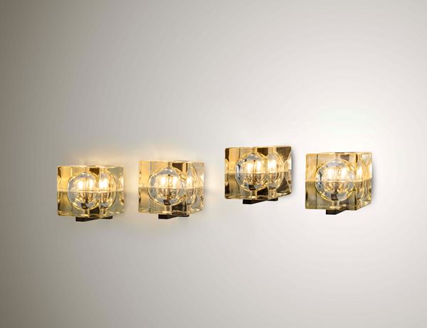 Quattro lampade a parete mod. Cubosfera.
