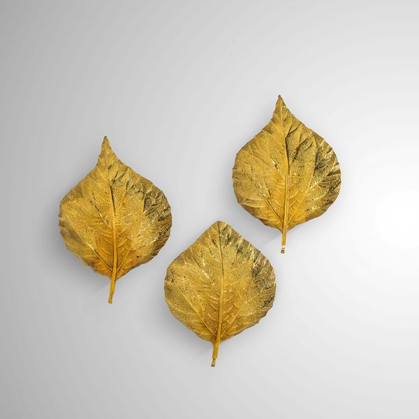 Tre lampade a parete