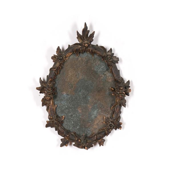 Specchiera con cornice ovale. Veneto XVIII secolo