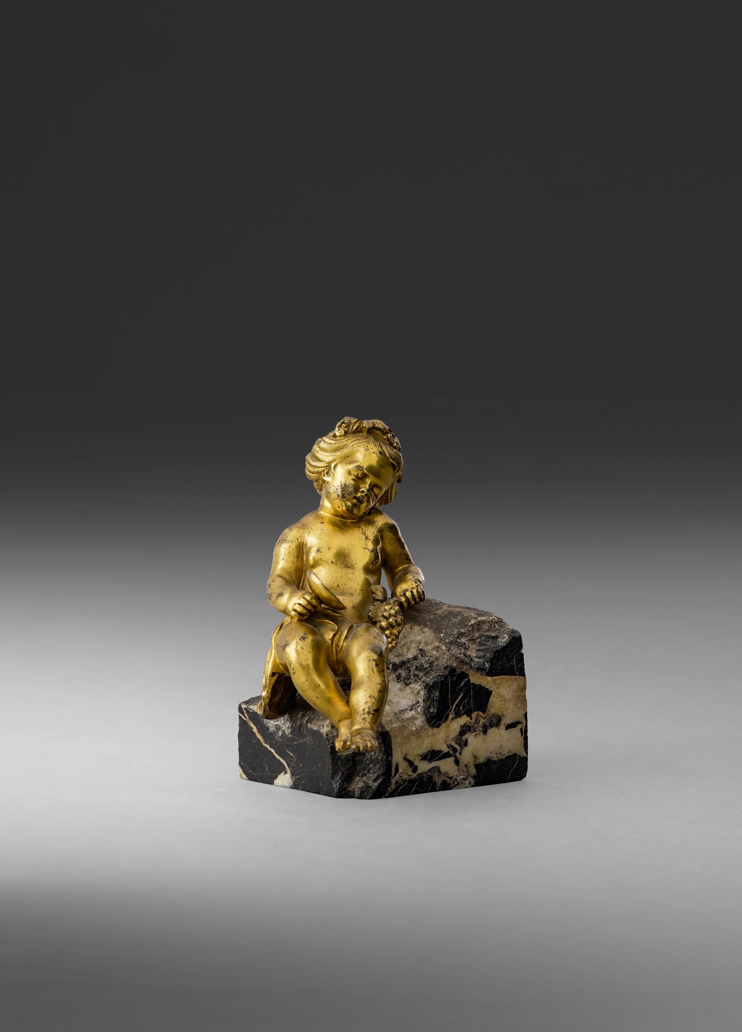 Bacchino ebbro, scultura in bronzo cesellato e dorato con base in marmo, XVII-XVIII secolo