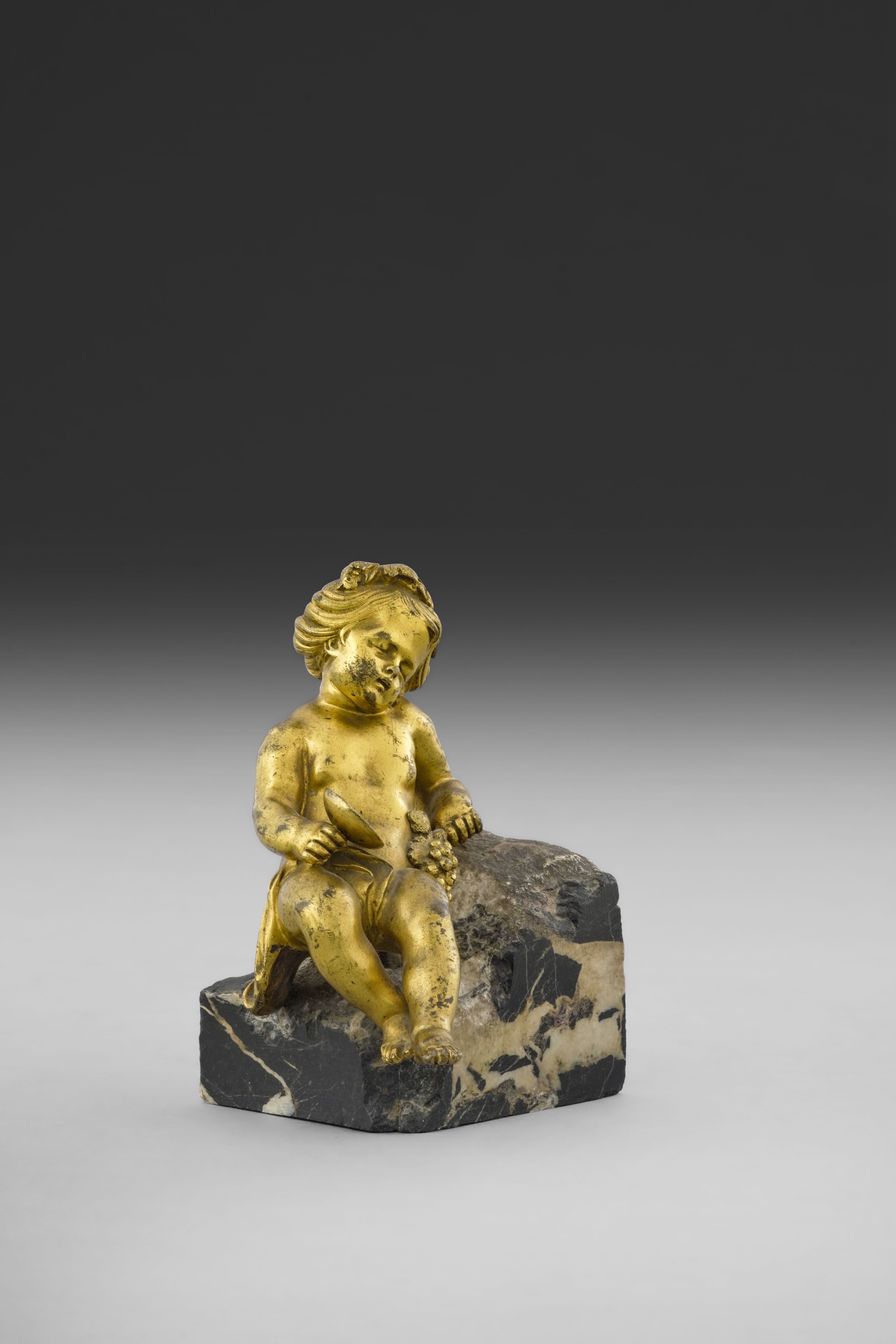 Bacchino ebbro, scultura in bronzo cesellato e dorato con base in marmo, XVII-XVIII secolo