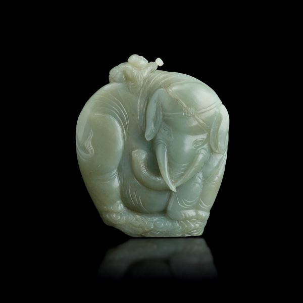 Celadon jade figure depicting an elephant with a figure and inscriptions, China, Qing Dynasty, 19th century