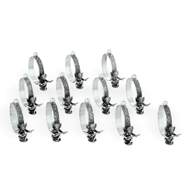 Dodici portatovaglioli segnaposto. Argenteria fiorentina del XX secolo