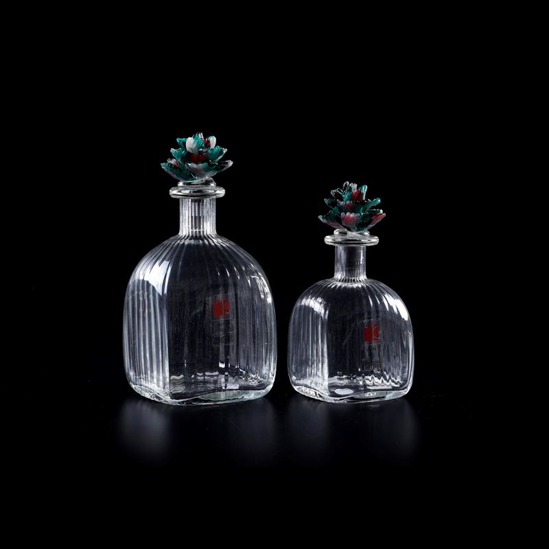 Due bottiglie. Italia, Murano, Manifattura Carlo Moretti, XX secolo.  - Auction The Art of the Table - Cambi Casa d'Aste