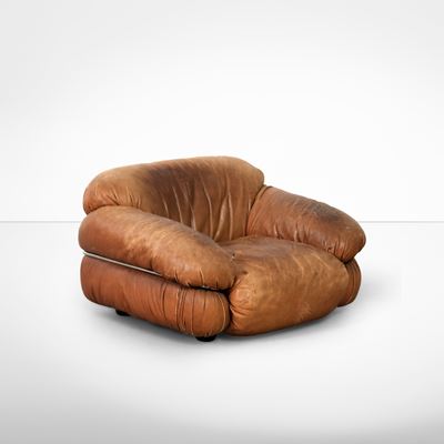 Poltrona mod. Sessan, legno e acciaio rivestita in cuoio
