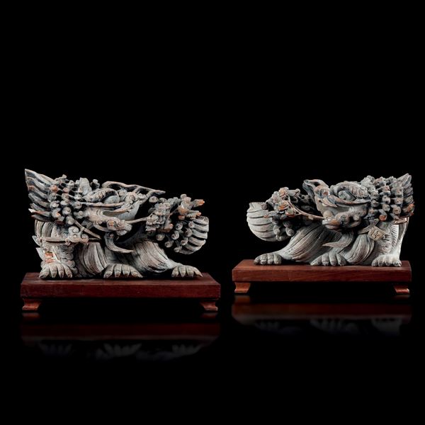 Coppia di sculture in legno raffiguranti draghi, Indonesia, fine XIX secolo