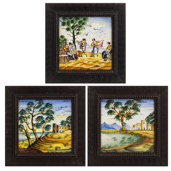 Tre piastrelle con paesaggi e figure. Deruta, XX secolo.