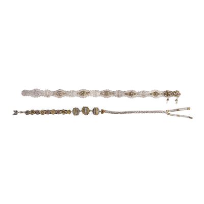 Due cinture, manifattura orientale in argento, turchese e corallo, XX secolo