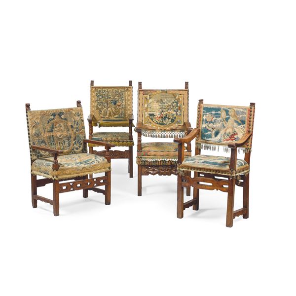 Quattro poltrone diverse in stile seicentesco